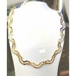 A SOLID GOLD 19 INCH WAVE CHOKER NECKLACE, fully hallmarked, with secure D-ring closure, 19 inches