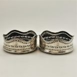 A PAIR OF 18TH CENTURY IRISH SILVER WINE BOTTLE COASTERS, Dublin, 1786, maker mark rubbed but