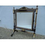 A VERY FINE NAPOLEON III STYLE EBONISED AND GILT FIRE SCREEN, with bevelled mirror front and