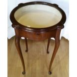A LATE 19TH CENTURY MAHOGANY CIRCULAR BIJOUTERIE DISPLAY TABLE / CABINET, circa 1890, with glazed