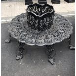 A CAST METAL TREE BENCH, the bench would surround a growing tree, 5ft round approx.