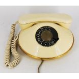 A RETRO IRISH MADE DAWN TELEPHONE, dated 1972 also known as The Pancake Phone.