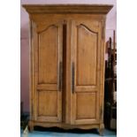 A LARGE TWO DOOR CABINET / CLOSET, with fitted interior, having drawers and a TV turn table, 225cm