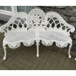 A WHITE METAL GARDEN BENCH, with shaped lattice back rest and star detail to the skirt
