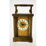 A FINE AND HANDSOME 19TH CENTURY CARRIAGE CLOCK, with enamel and gold face, 11cm tall approx.