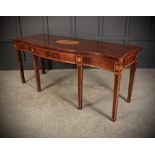 A FANTASTIC GEORGIAN MAHOGANY INLAID SERVING / HALL TABLE, of serpentine shape, with cross-banded