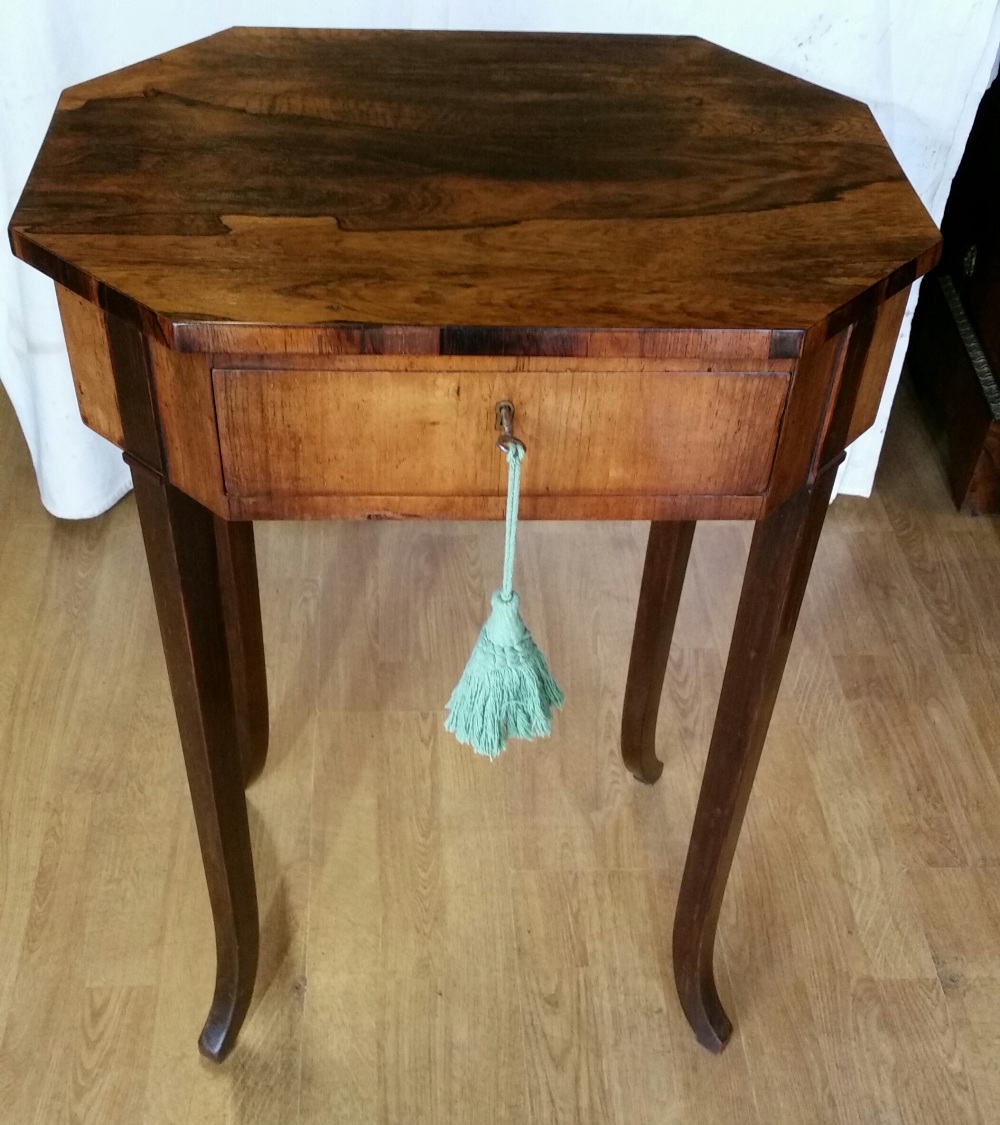 A GEORGE III ROSEWOOD WRITING / SEWING TABLE, circa 1820, of hexagonal shape, with lifting top