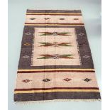 A KELLIM RUG, hand woven over four months on an upright hand loom by two weavers in Benares (