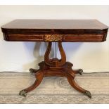 A VERY FINE REGENCY ROSEWOOD BRASS INLAID FOLD OVER CARD / GAMES TABLE, with stunning brass inlaid