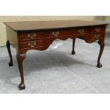A VERY FINE BIRDS-EYE WALNUT PARTNERS DESK, with beautifully tooled leather top, over an arrangement