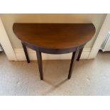 A GOOD QUALITY MAHOGANY DEMI LUNE TABLE, raised on square tapered legs, 110cm (L) x 55cm (D) x