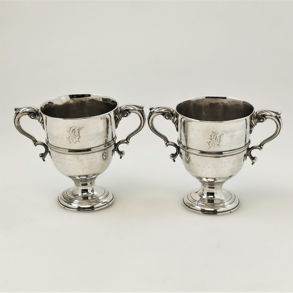 A PAIR OF MID 18TH CENTURY IRISH SILVER TWO HANDLED CUPS, Dublin, 1753, with maker mark of DK within