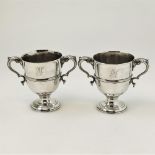 A PAIR OF MID 18TH CENTURY IRISH SILVER TWO HANDLED CUPS, Dublin, 1753, with maker mark of DK within