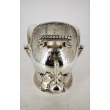 A GOOD QUALITY SILVER PLATED SUGAR BOWL, in the form of a helmet, with a shovel spoon, 14cm long