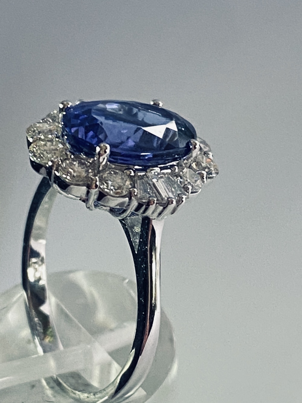 AN 18CT WHITE GOLD ART DECO STYLE TANZANITE AND DIAMOND CLUSTER RING, the superb oval shaped - Image 10 of 12