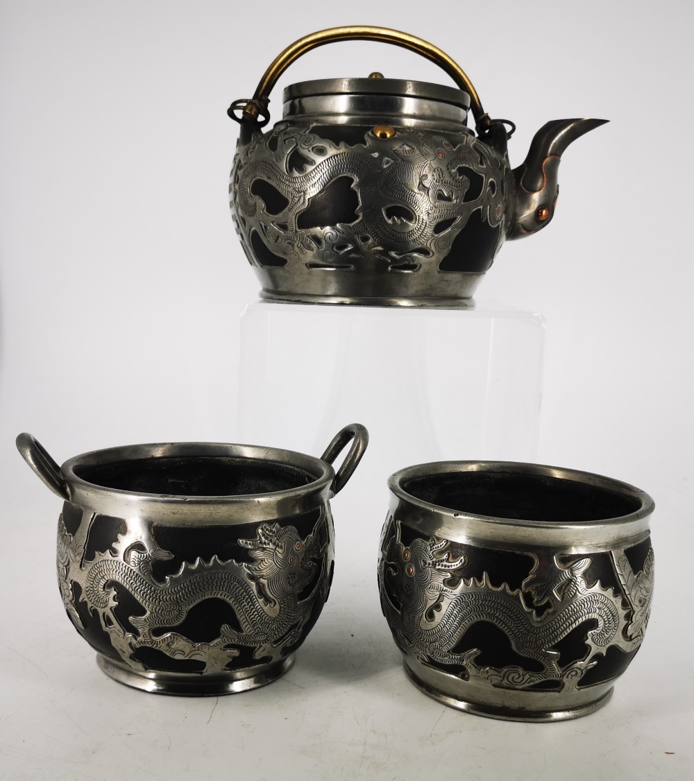 A LATE 19TH / EARLY 20TH CENTURY CHINESE HORCHUNG PEWTER AND BLACK STONEWARE TEA SET, decorated