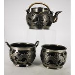A LATE 19TH / EARLY 20TH CENTURY CHINESE HORCHUNG PEWTER AND BLACK STONEWARE TEA SET, decorated