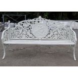 A CAST METAL FOUR SEATER GARDEN BENCH, with classical picture panel to the back, 190cm long approx.