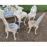 A GOOD QUALITY CAST IRON GARDEN SUITE, includes table and chairs