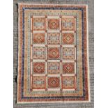 A GOOD QUALITY AFGHAN ZIARAT FLOOR RUG, with mixed of pile and flat weave techniques giving the