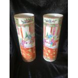 A PAIR OF CHINESE FAMILLE ROSE CYLINDRICAL VASES, with bird and floral pattern to one side, and a