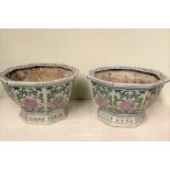 A PAIR OF OCTAGONAL SHAPED FAMILLE VERTE STYLE PLANTERS, with floral motif and pierced base, 39cm