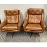 A PAIR OF VERY GOOD MID CENTURY MODERN STYLE TAN LEATHER BUTTON BACK BOWL SEAT ARMCHAIRS, with