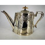 A VICTORIAN SILVER PLATED TEA POT, decorated with floral design, 19cm tall x 21cm wide approx.