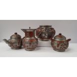 AN EARLY 20TH CENTURY TUNG KING SHUN PEWTER MOUNTED TERRACOTTA TEA SET, includes tea and coffee pot,