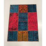 A PERSIAN PATCHWORK RUG, hand woven in Iran, patchwork rug combining genuine vintage rugs from