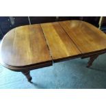 A VICTORIAN OAK DINING ROOM TABLE on turned leg, 4ft wide x 80in long approx., with one extra leaf