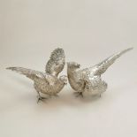 A PAIR OF VERY EARLY 20TH CENTURY SILVER PHEASANTS, circa 1900, with silver purity mark of A835