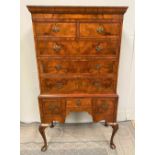 A VERY FINE QUEEN ANNE STYLE WALNUT CHEST ON STAND OR HIGH BOY, with cross-banded detail to the