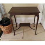 A RECTANGULAR MAHOGANY SIDE TABLE, raised on cabriole legs united by a raised lower tier shelf, 71cm