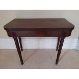 A GOOD 19TH CENTURY FOLD OVER TEA TABLE, with reeded rim, a single frieze drawer, raised on ring