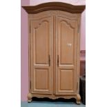 A LARGE TWO DOOR WARDROBE, with hanging rail to the interior, in very good condition, 148cm tall x 1