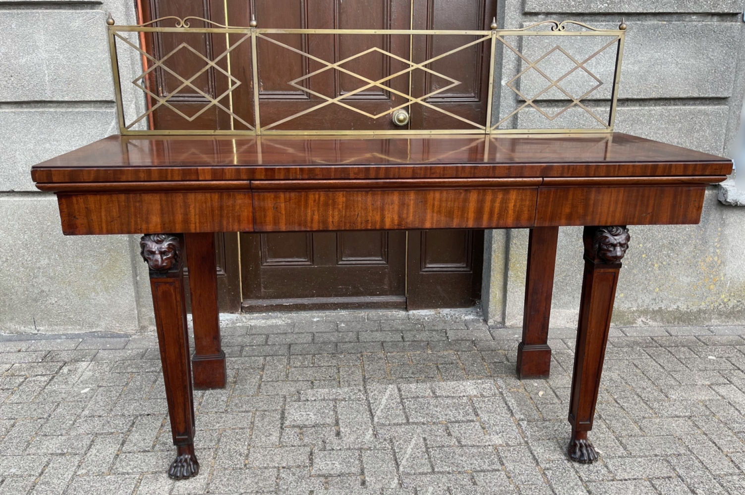 A GOOD QUALITY IRISH MAHOGANY SERVING / SIDE BOARD, with brass gallery rail to the back, with cross- - Image 2 of 7