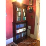 A GLOBE WERNICKE FLOOR BOOKCASE, with three lift back glazed doors to the lower tier, and single bas