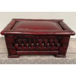 A GOOD QUALITY CHESTERFIELD STYLE OTTOMAN, with lift up top, which opens to reveal compartment withi