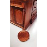 A COPPER BED PAN HEATER, with pierced decoration to the lid and turned wooden handle, 89cm x 31cm ap