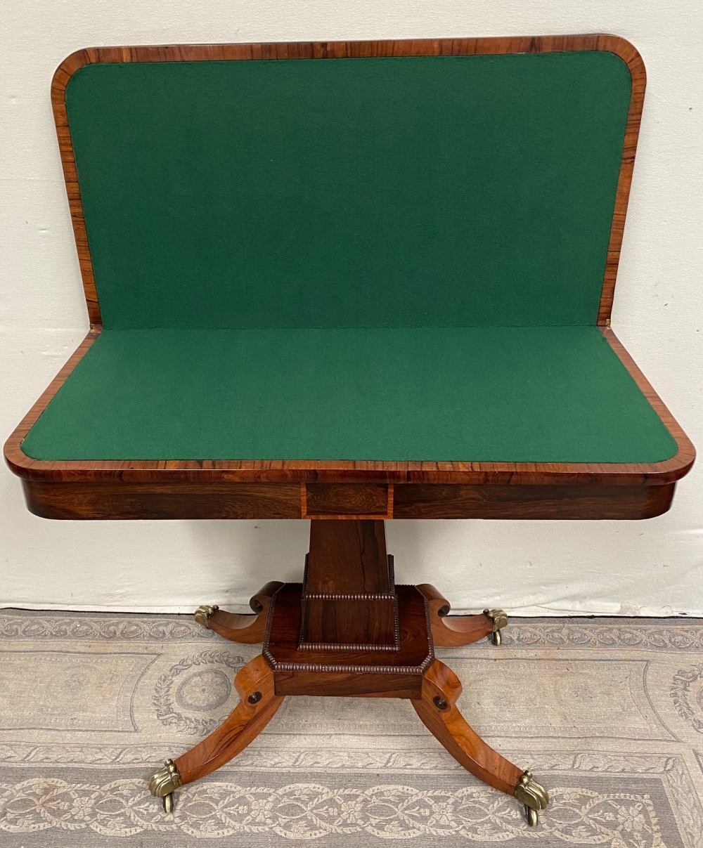 A FINE REGENCY ROSEWOOD FOLD OVER CARD TABLE, with cross-banded top having rounded corners, over a d - Image 7 of 7