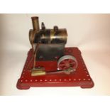 A VINTAGE TIN PLATE MARKLIN STATIONERY STEAM ENGINE, 20cm x 17cm approx.