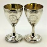 A VERY FINE PAIR OF 18TH CENTURY BRIGHT CUT SILVER GOBLETS, with gilt interiors, London, 1796, by th
