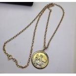 A 9CT GOLD CIRCULAR SAINT CHRISTOPHER PENDANT NECKLACE, with belcher chain, with decoration to both