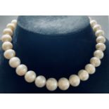 A GRADUATED SOUTH SEA PEARL NECKLACE, the pearls with fabulous lustre; largest pearl is 18mm and the
