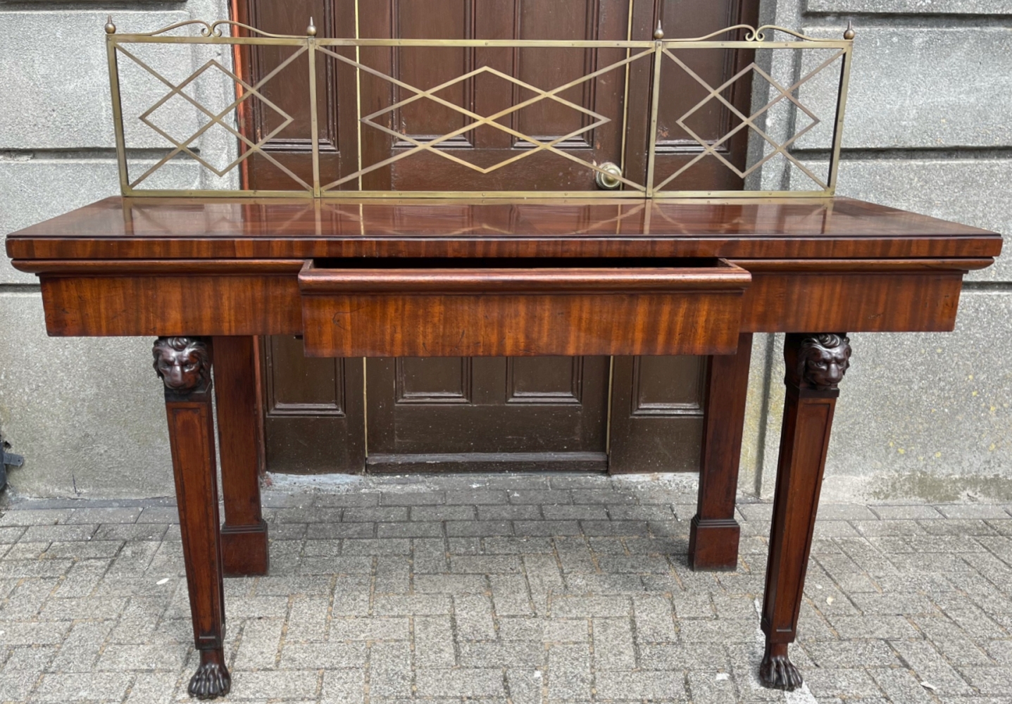 A GOOD QUALITY IRISH MAHOGANY SERVING / SIDE BOARD, with brass gallery rail to the back, with cross- - Image 7 of 7