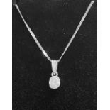 A VERY FINE 18CT WHITE GOLD BEZEL SET DIAMOND PENDANT NECKLACE, diamond weight: .60ct approx. Chain