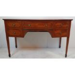 A VERY FINE EDWARDIAN SATINWOOD BOW FRONTED DRESSING TABLE / DESK, with book matched / cross-banded