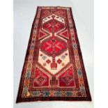 A GENUINE PERSIAN HAMADAN CARPET, hand knotted in Torsikan, North West Iran c.1950. Material: local