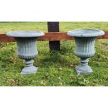 A PAIR OF HEAVY CAST IRON REGENCY STYLE FLYTED GARDEN URNS, 47cm (H) x 38.1cm (W) approx.